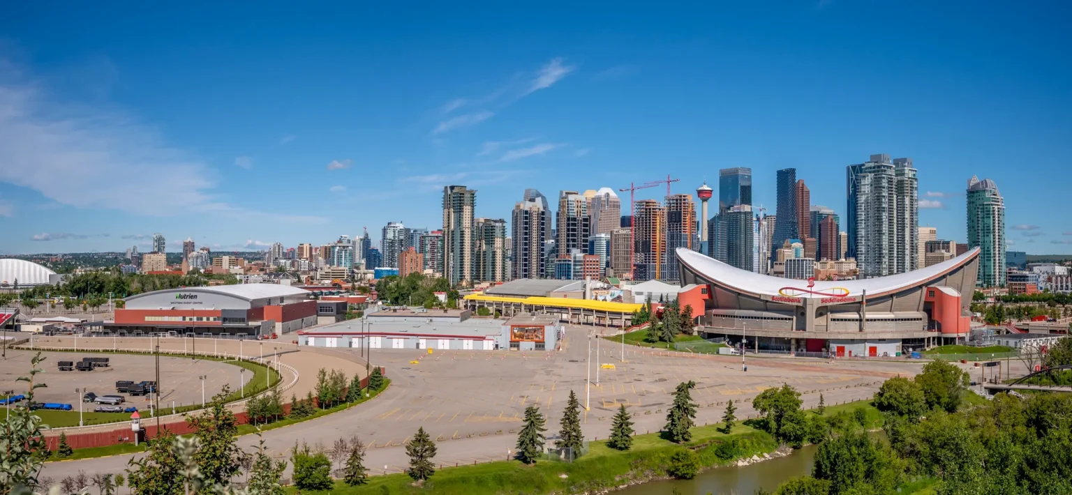 Calgary Home Garden Show 2025 Calgary, Alberta Canada City Skyline With A River And A Parking Lot Includes Bmo Centre @ Stampede Park, Scotiabank Saddledome, And The Calgary Tower.