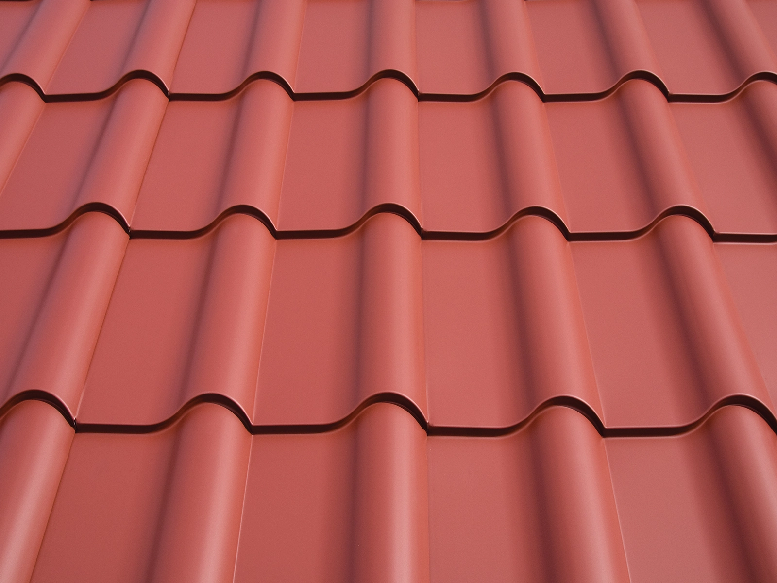 Low-porosity metal roofing tiles in a terracotta color, showcasing heavy-gauge aluminum profiles designed for durability and aesthetic appeal, suitable for all-season stability and long-term protection in Eufaula, WA.