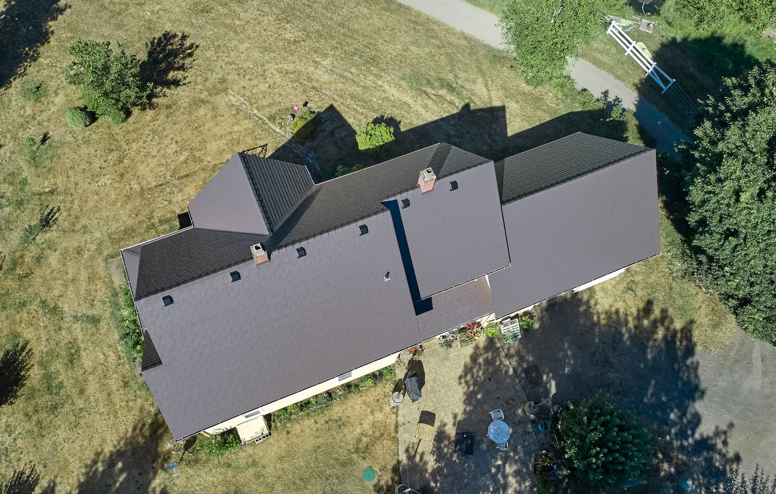 Longview, Wa 97202 Interlock Metal Roofing Tudor Brown Aluminum Cedar Shingle Roof Aerial